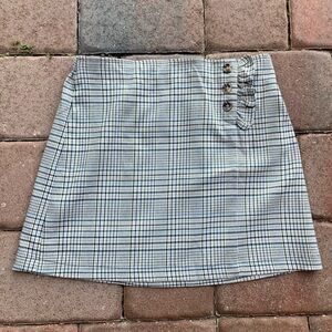Y2K Plaid Skirt with Button and Ruffle Accent